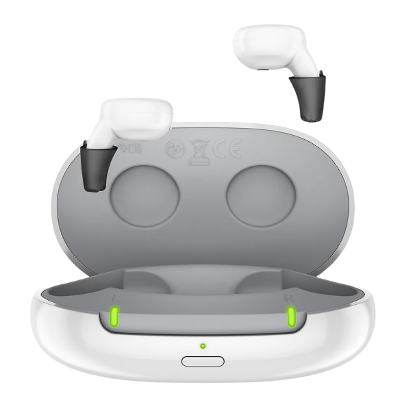 Active IX charger open with hearing aids above it