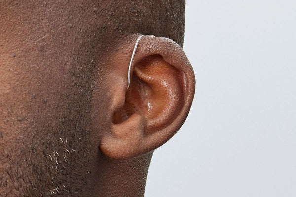 Man wearing Oticon Intent 1 miniRITE R hearing aid