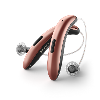 Rose gold Phonak hearing aid on a white background