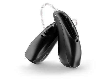 Pair of black hearing aids on a white background