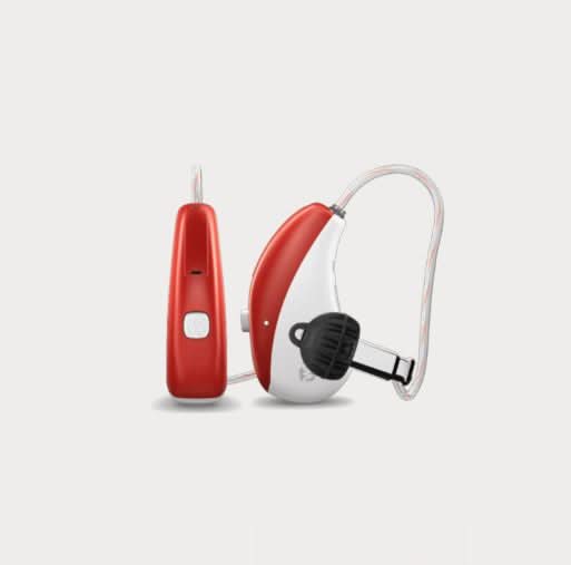 Red and white hearing aid on a light gray background