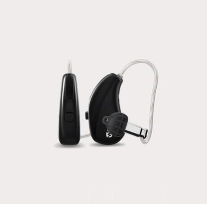Black hearing aid device on a light gray background