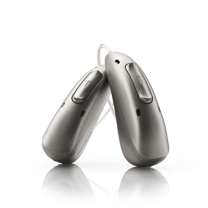 Pair of hearing aids on a white background