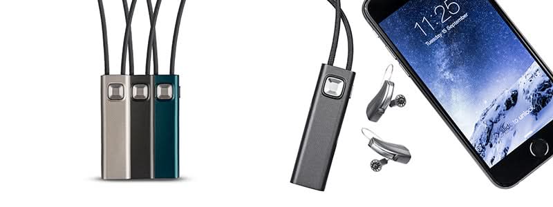 Four Widex comdex in different colors with paid of hearing aids and a cellphone